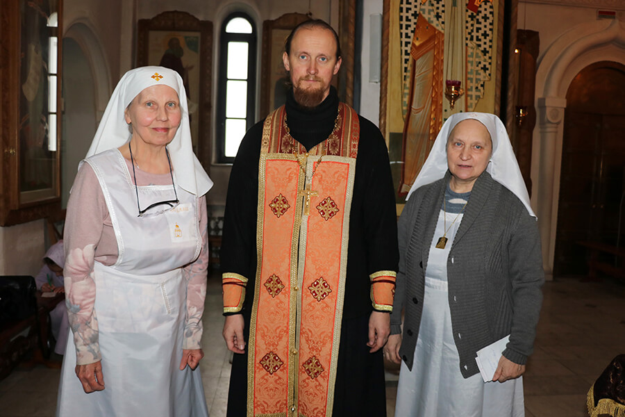 lay sisters with priest